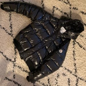 Short black Moncler puffer jacket